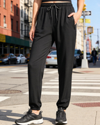 Rebecca Pantalón Deportivo Mujer – Tejido Secado Rápido, Cintura Alta y Bolsillos Zip
