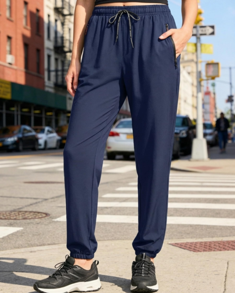 Rebecca Pantalón Deportivo Mujer – Tejido Secado Rápido, Cintura Alta y Bolsillos Zip